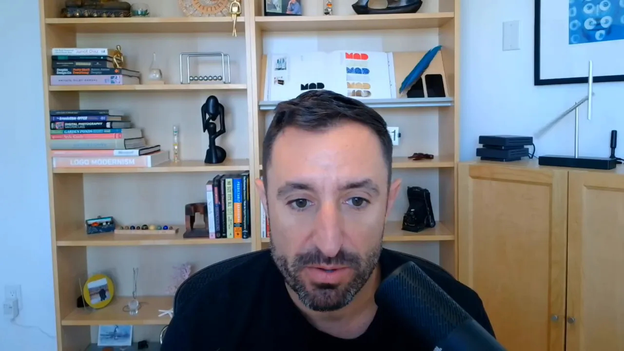 Host in a purple acoustic booth, centered and speaking in a clear head-and-shoulders frame